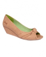 A demure finish to a skirt or capris. The Court peep-toe wedges by Blowfish are topped off with a trendy knot detail.