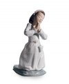 A beautiful way to commemorate your daughter or granddaughter's first communion, this artfully crafted Lladro figurine evokes the momentous occasion in glazed porcelain.