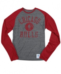 Longtime favorites. Display your Chicago Bulls pride with this throwback, vintage-style NBA shirt from adidas.