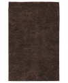 Step onto a cloud-soft area rug in chocolate brown wool. Offering one of the thickest, plushest hands in the industry, the Surya Metropolitan area rug billows with softness in every space.
