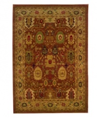 Intricately designed in warm red and gold tones with rich, dark accents, this stately rug adds distinguished decoration to both casual and formal rooms in your home. Soft nylon fabric is cross-woven for exceptional durability.