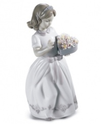 This little angel is poised to make a beautiful offering for someone special. Stands 9.75 tall.