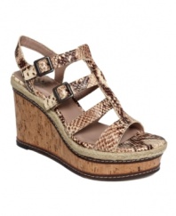 Gain mega height from the masterful Serafina sandals by Vince Camuto. Beautifully finished straps atop an espadrille-trimmed cork heel are just what your warm-weather wardrobe is missing.