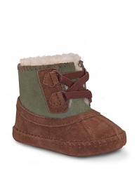 At the crossroads of the boot and bootie, this cute boot gets it right with soft 2-tone sheepskin upper and cozy plush lining.