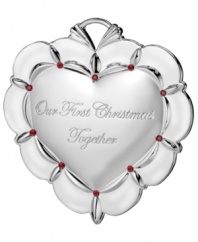 With all your heart. Have a romantic holiday with an engraved Waterford ornament commemorating your first Christmas together. Featuring polished silver plate with sparkling ruby-red accents.