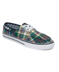 Skate style and preppy polish combine on the Hullie sneakers by Vans. Madras-inspired plaid keeps the fun in this beach-ready boat shoe design.