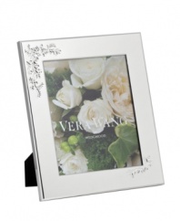 Picture perfect. An embossed motif graces this Vera Lace Bouquet picture frame, embodying the timeless beauty of Vera Wang in lustrous silver plate. A versatile choice for landscape or portrait photos.