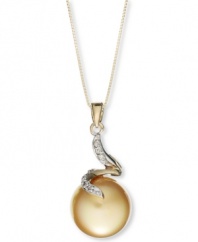 The golden touch. This rich pendant features a cultured golden South Sea pearl (12-13 mm) and swirls of round-cut diamond accents. Set in a 14k gold. Approximate length: 18 inches. Approximate drop: 1 inch.