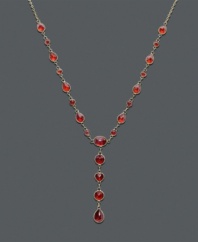 Ignite a flame with bold color along your neckline. This dramatic v-shaped necklace features brilliant oval-cut, round-cut, and pear-cut garnet (8-5/8 ct. t.w.) in a 14k gold setting. Approximate length: 17 inches. Approximate drop: 1-1/2 inches.