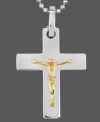 A stylish way to keep the faith. This symbolic men's pendant features a crucifix design crafted in stainless steel with 14k gold accents. Comes on a matching ball chain. Approximate length: 24 inches. Approximate drop length: 1-1/2 inches. Approximate drop width: 1-1/4 inches.