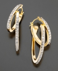 Interlocking hoops studded with a diamond accent set in 14k gold for a luxurious look.