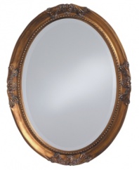 Feel like royalty in the presence of the Queen Ann oval mirror. Elegant flourishes and inner beading dressed in radiant gold leaf grace an antique-inspired frame.