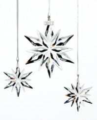 Celebrating 20 years of Swarovski's Annual Edition Christmas ornament, this elegant boxed set includes one Annual Edition 2011 and two Little Star ornaments. Each piece hangs elegantly on a delicate white satin ribbon and sparkles beautifully in clear crystal. The perfect gift for your loved ones!