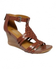 Pump up your casual look with the uniquely slim wedge heel of the Warm Cedar sandals by Kenneth Cole Reaction. The woven leather straps are reminiscent of classic huarache sandals.