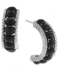 Stir up a little drama with 2028's alluring earrings. These partial hoops feature jet black beads set in silver tone mixed metal. Approximate drop length: 1-1/4 inches. Approximate drop diameter: 3/4 inch.