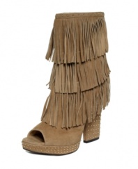 Look fabulous in fringe. Enzo Angiolini's Flore booties feature swishy fringe all over the shaft. A chunky heel and pretty peep-toe complete the look with pizzaz.