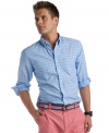 Cool chambray ups the ante on your casual look with the classic windowpane pattern on this Izod shirt.