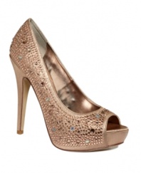 Blushing beauty. Lend rosy radiance to your look with the rhinestone-trimmed Cycile platform pumps by Steve Madden.