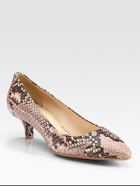 Stamped python leather pointed toe silhouette. Self-covered heel, 2 (50mm)Python stamped leather upperPoint toeLeather liningRubber solePadded insoleImportedOUR FIT MODEL RECOMMENDS ordering one half size up as this style runs small. 