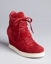 The wedge sneaker pump is back and at the height of the trends; Ash nails the look in a super cool high top style.