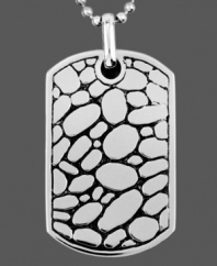 Take on the latest trend in this stylish men's pendant. Set in stainless steel a chic dog tag pendant features a unique textured design. Approximate length: 24 inches. Approximate drop length: 1-1/2 inches. Approximate drop width: 1 inch.