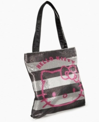 Handy accessory. She can keep herself organized even when she's on the go with this trendy tote from Hello Kitty.