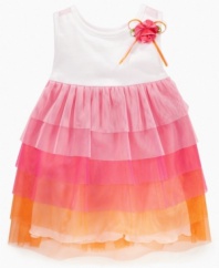 Somewhere over the rainbow. She'll look like she's straight out of the movies in this colorful ruffle dress from Sweet Heart Rose.