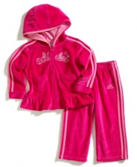 Show her just how soft of a spot you have for her with this cozy velour jacket and pant set from adidas.