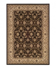 Pulling inspiration from the masterwork of 16th and 17th-century Persian artisans, this heirloom-quality rug adheres to centuries-old tradition with an unmatched beauty that still holds up today. An intricate, full-frame curvilinear pattern features swirling Arabesques and blossoms set in a rich palette of ebony and creme. Meticulously styled, the use of ultra-fine yarn allows for superb detail, crisp design and a soft hand. One-year limited warranty.
