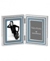 Add new elegance to beautiful memories with Vera Wang's With Love Dusk folding picture frame. Geometric detail lends metallic shimmer to slate-blue enamel in a home accent that invokes modern and deco design.