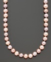 The epitome of femininity. Belle de Mer's pretty pink necklace features cultured freshwater pearls (6-7 mm) and a 14k gold clasp. Approximate length: 18 inches.