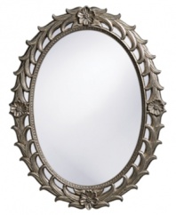 Pewter flowers form an elegant wreath around the Eileen oval mirror. Elaborate textural details and an intricate pattern on the inner rim add notes of refinement and classic appeal.