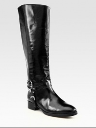 An edgy chain backs this equestrian-inspired leather silhouette, layered with adjustable buckle straps. Stacked heel, 1¼ (30mm)Shaft, 17Leg circumference, 15Leather upperPull-on styleLeather lining and solePadded insoleImported