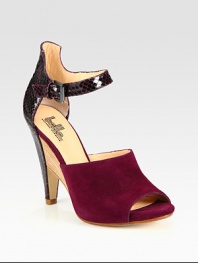 An adjustable snakeskin-printed leather ankle strap combines with suede in this open toe sandal. Snakeskin-printed leather heel, 4½ (115mm)Covered platform, ½ (15mm)Compares to a 4 heel (100mm)Suede and snakeskin-printed leather upperOpen toeLeather lining and solePadded insoleImported
