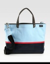 Tote your belongings around town in style this season with this structured canvas bag, dipped in rubber latex for added protection, in contrasting colors that lends a nautical feel to a contemporary design.Double top handlesAdjustable shoulder strapInterior zip pocketCanvas14W x 16H x 6DImported