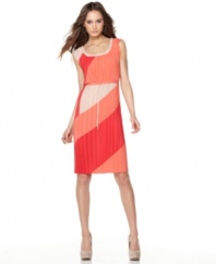 Bright colorblocking adds a graphic edge to this otherwise softly pleated BCBGMAXAZRIA dress -- perfect for a day-to-night look!