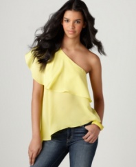 With a dramatic ruffle and asymmetrical hem, this bright BCBGeneration top adds a bold splash of style to any of your spring denim!