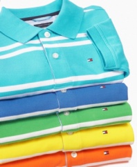 Let him show his stripes with this striped polo shirt from Tommy Hilfiger, with cool cotton and bright colors perfect for the warm sunny weather.