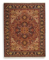 This Windsor rug from the English Manor Collection symbolizes the perfect symmetry and balance found in architecture of the infamous Windsor Castle, home to the Queen of England. This timeless design captures attention with a versatile color palette of red, indigo, ivory, yellow, caramel, terra cotta, blue and green, all specially dyed to create a graduated, vintage look. Each is woven in luxuriously soft New Zealand wool and finished with Krastan's patented Luster-Wash(tm) process for an antique-like find.