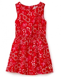 Gorgeously designed with a batik floral print, this sleek silk dress is a lovely choice for a summer party.