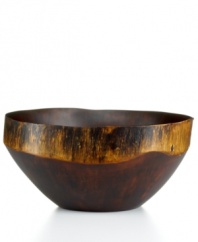 Naturally brilliant. Large but surprisingly light, the Einstein Rustic serving bowl is named for the artist and hand-carved from the trunk of a fast-growing, renewable obeche tree found in Haiti's gorgeous mountainsides. With a lacquer finish to handle hot and cold foods. From Heart of Haiti's collection of serveware and serving dishes.
