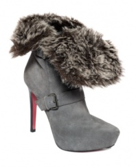 Capitalize on cold weather and accessorize all you want. A thick faux fur cuff warms up the sleek, suede Candace booties by Paris Hilton.