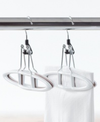 Quit skirting around the issue! Clean up your closet with these innovative, non-slip pant and skirt hangers. Interior grips keep garments in place and off the floor, while heavy duty chrome clamps and hooks let you hang up even your heaviest pieces of clothing.