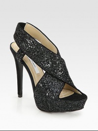 This glittery silhouette with soft suede trim and a piercing heel is the best companion for a night out. Suede-covered heel, 5 (125mm)Glitter-covered platform, 1¼ (30mm)Compares to a 3¾ heel (95mm)Glitter-coated fabric upper with suede trimLeather liningLeather and rubber solePadded insoleImported