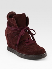 Must-have sneakers rendered in ultra-soft suede, with a hidden wedge and wrap-around laces. Hidden wedge, 4 (100mm)Rubber platform, ¾ (20mm)Compares to a 3¼ heel (80mm)Suede upperLeather liningRubber solePadded insoleImported