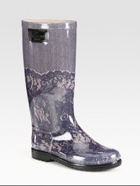 Pretty lace-patterned rainwear with logo detail at the top.Rubber heel, 1 (25mm) Shaft, 12½ Leg circumference, 15 Rubber upper with printed cotton lining Padded insole Rubber sole Made in ItalyOUR FIT MODEL RECOMMENDS ordering true whole size; ½ sizes should order the next whole size up. 
