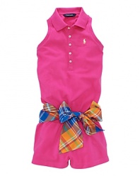 The classic polo shirt inspired a stylish racerback romper, rendered in stretch cotton mesh and finished with a preppy plaid self-belt.