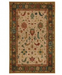Distinctive coloration distinguishes this Karastan area rug from its classic counterparts, featuring a meticulously styled ground with traditional vine-and-blossom details. Woven from lush nylon that delivers softness underfoot and superb resistance to everyday wear.