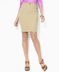 Tailored in a sleek, streamlined silhouette, Lauren by Ralph Lauren's skirt is crafted from crisp cotton chino with a hint of stretch for a flattering fit.