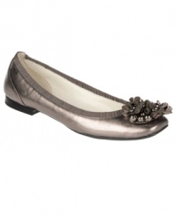 Toute sweet! Featuring a fabric ruffle and flower accent against a metallic backdrop, the charming Lani shoes by Etienne Aigner put the ballet back in ballet flat.